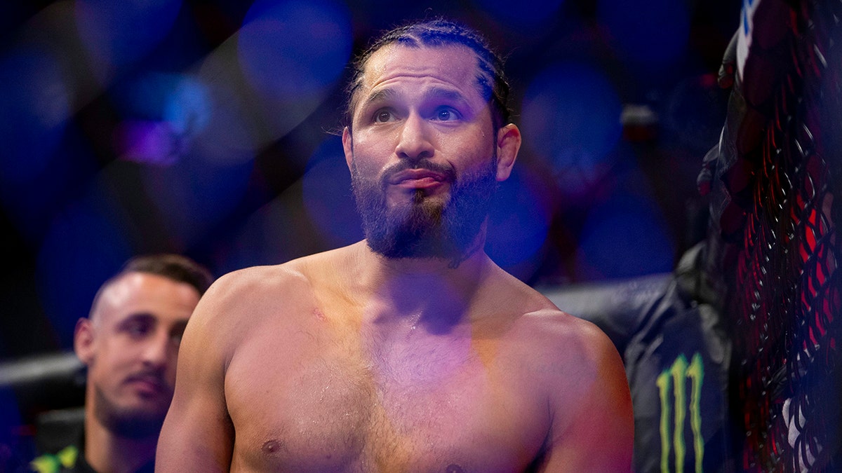Jorge Masvidal celebrates his knockout victory over Ben Askren during their welterweight mixed martial arts bout at UFC 239, Saturday, July 6, 2019, in Las Vegas. Masvidal won by the fastest knockout in UFC history. (AP Photo/Eric Jamison)