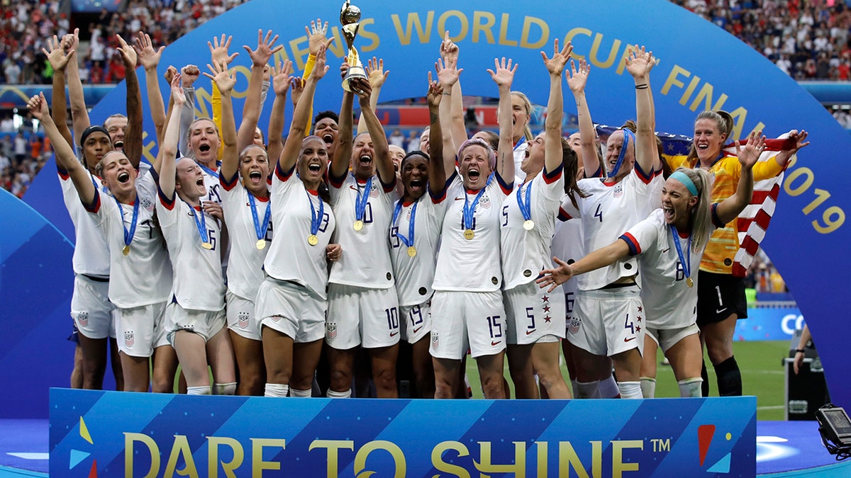 United States' team celebrates with the trophy after winning the Women's World Cup final soccer match between US and The Netherlands at the Stade de Lyon in Decines, outside Lyon, France. (AP Photo/Alessandra Tarantino, file)