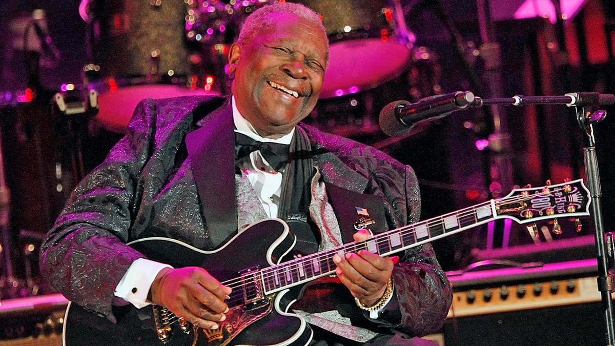 FILE - In this June 20, 2008 file photo, musician B.B. King performs at the opening night of the 87th season of the Hollywood Bowl in Los Angeles. Julien’s Auctions announced Tuesday, July 23, 2019, that King’s black Gibson ES-345 prototype guitar is among the items from his estate that will go up for bid on Sept. 21. Julien’s says Gibson gave King the instrument for his 80th birthday. (AP Photo/Dan Steinberg, File)