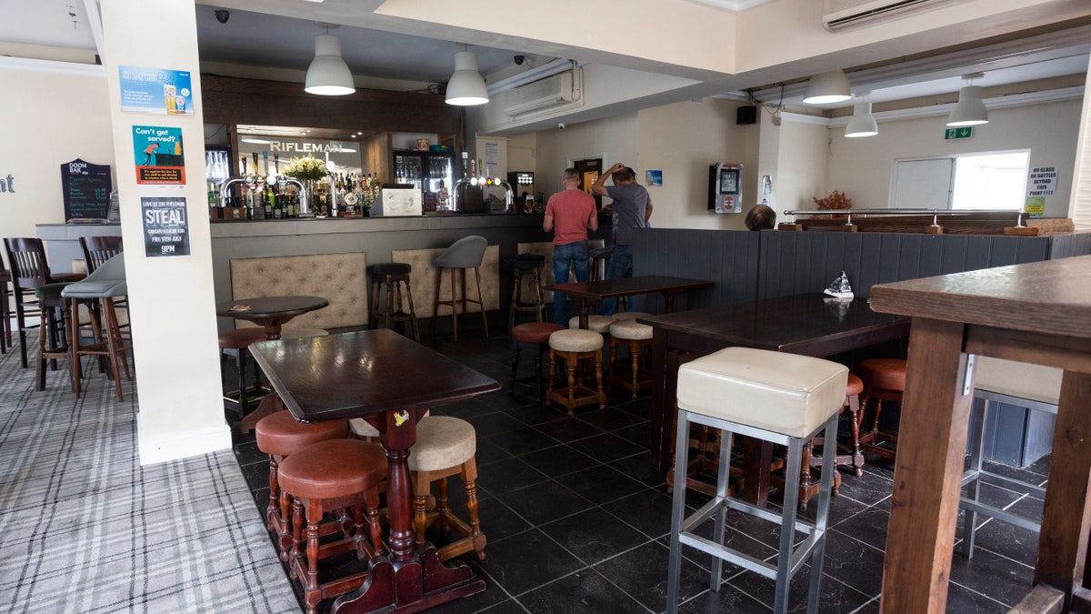 Inside the recently opened The Old Thirteenth Cheshire Astley Volunteer Rifleman Corps Inn, which is now less than 150 feet away from the bar with the shortest name.