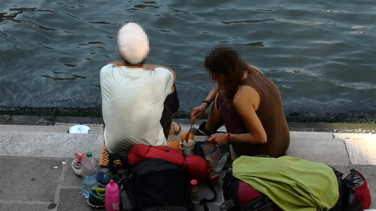 Two tourists to Venice, pictured, were forced to wake up and smell the coffee after getting smacked with a $1,067 fine for brewing up java with a travel cooker on the steps of a historic bridge.