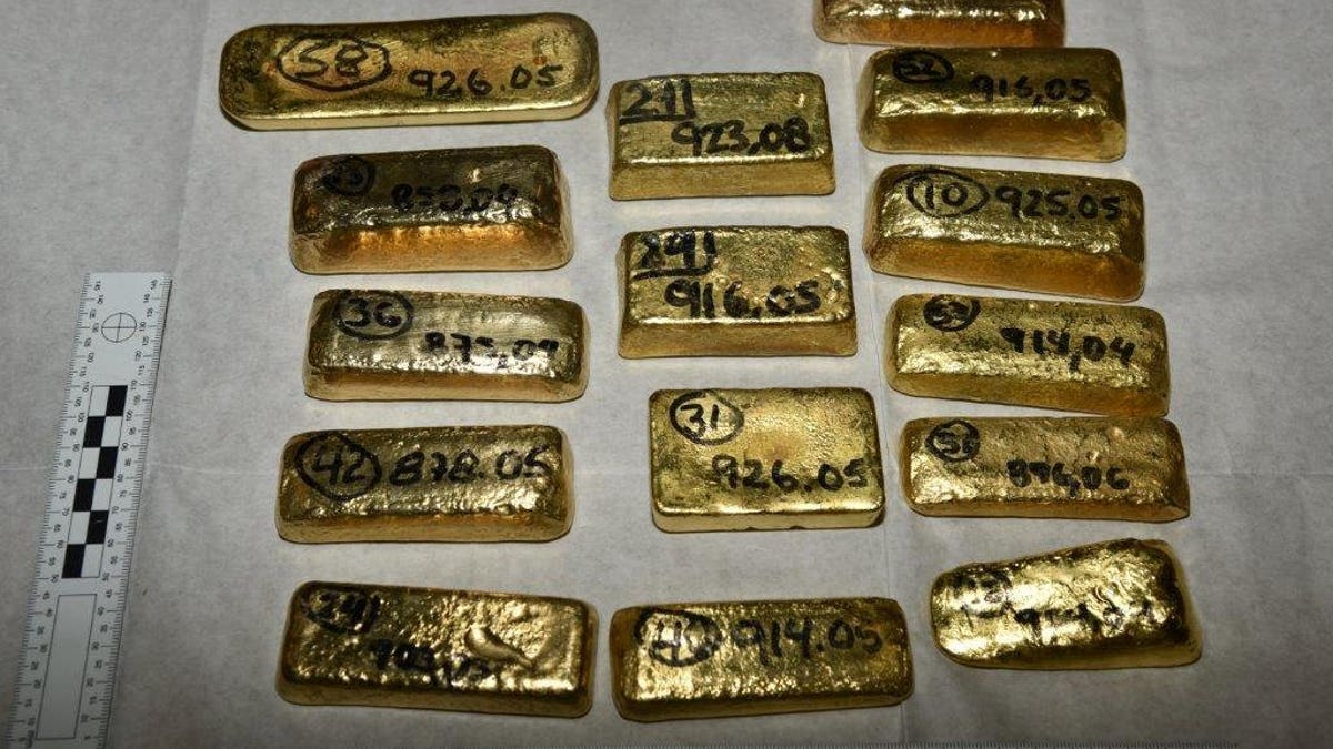 Five million dollars’ worth of gold bars, partially pictured here, have been seized at London’s Heathrow Airport by law enforcement officials investigating a South American drug cartel.