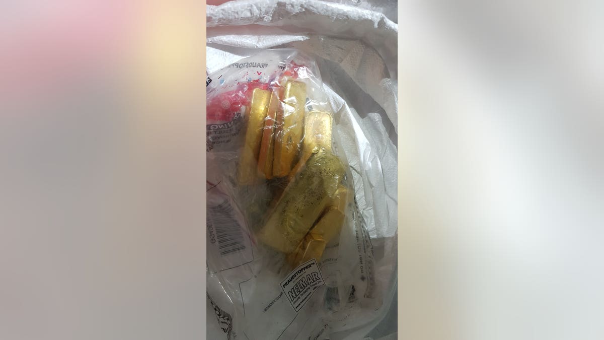 Some of the gold, pictured here, being transported from the Cayman Islands to Switzerland, having earlier been shipped to the Caymans on a private jet which had arrived from Venezuela.