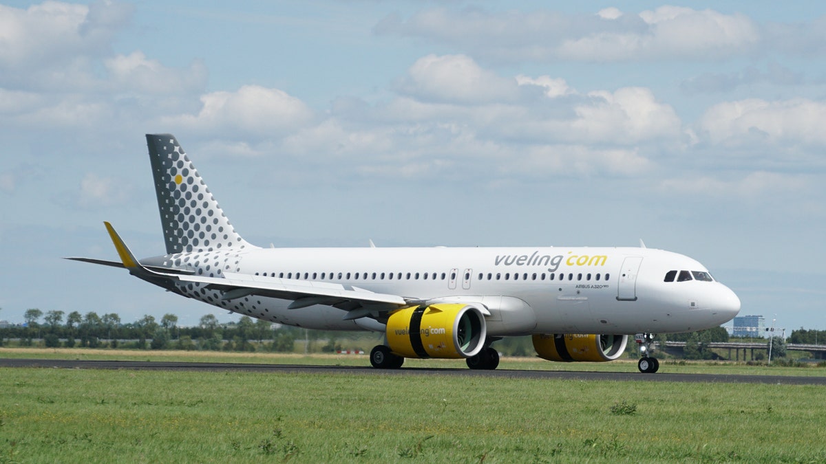 The woman and her boyfriend boarded the Vueling flight in Palma, the capital of the Spanish island of Mallorca, on Sunday for a vacation in Barcelona, according to the UK’s Mirror.