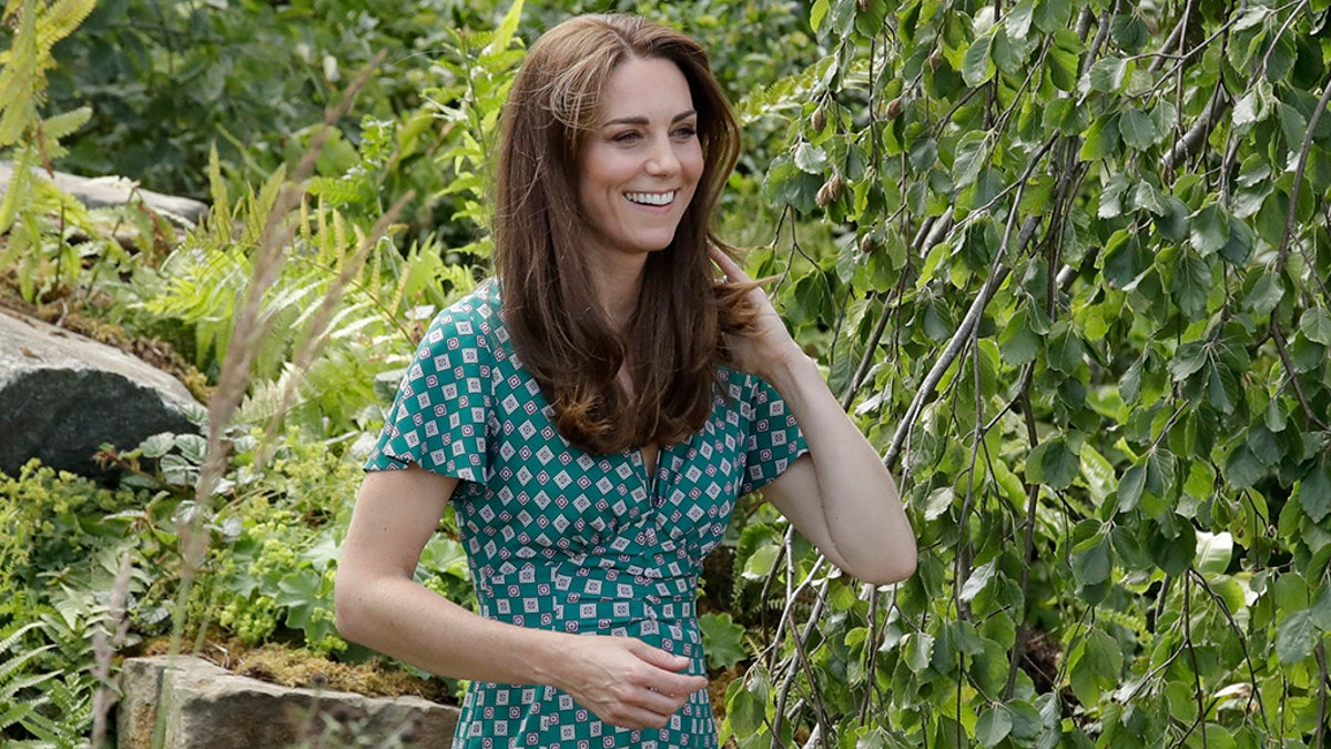 Kate, the Duchess of Cambridge visits her "Back to Nature" show garden during the press day for the Royal Horticultural Society Hampton Court Palace Garden Festival in London in July.