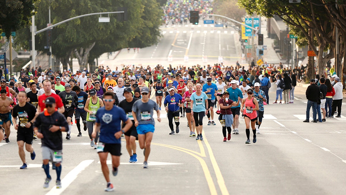 Runners climb First Street during the 2019 Skechers Performance Los Angeles Marathon March 24, 2019. (Photo by Katharine Lotze/Getty Images)