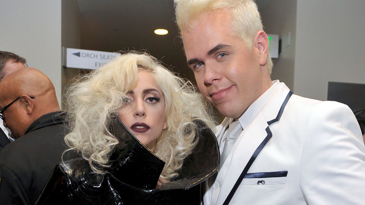 Singer Lady Gaga, left, and Perez Hilton pose backstage at the 2009 American Music Awards at Nokia Theatre L.A. Live on November 22, 2009 in Los Angeles, California. (Photo by Charley Gallay/AMA2009/Getty Images for DCP)