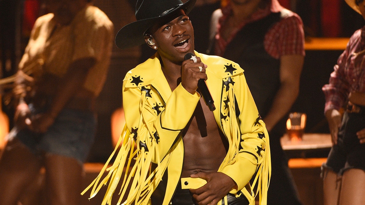 Lil Nas X performing "Old Town Road" at the BET Awards in Los Angeles. (Photo by Chris Pizzello/Invision/AP, File)