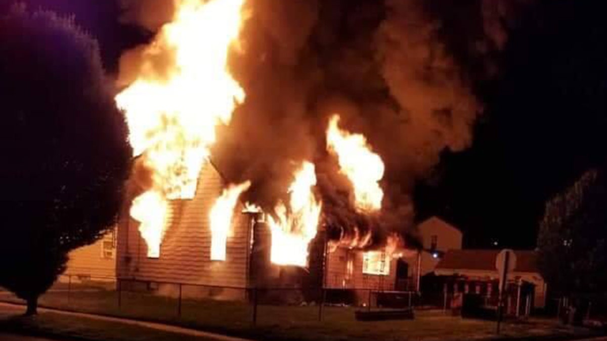 A home under renovation that caught fire in Linden, N.J., on Thursday night. Police are investigating whether or not the blaze is linked to other 'suspicious' fires in the area.