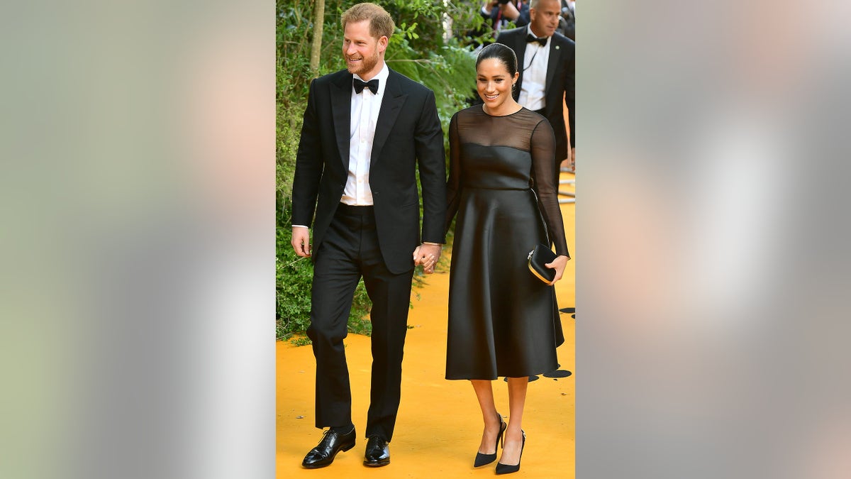 LONDON, ENGLAND - JULY 14: Meghan, Duchess of Sussex  and Prince Harry, Duke of Sussex attend 