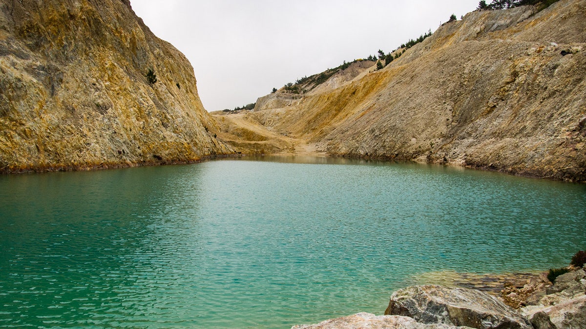 The Instagram-famous, turquoise lake is in fact a chemically contaminated “toxic dump.”