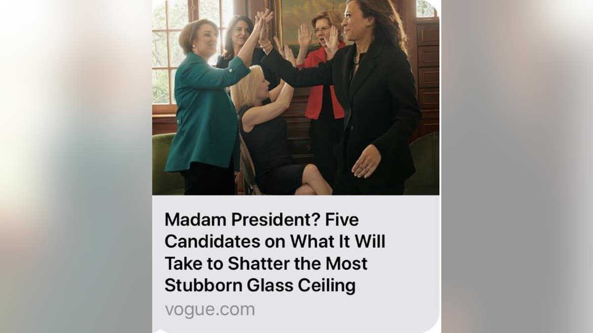 Five female lawmakers shown in a Vogue photo shoot giving each other high fives. 