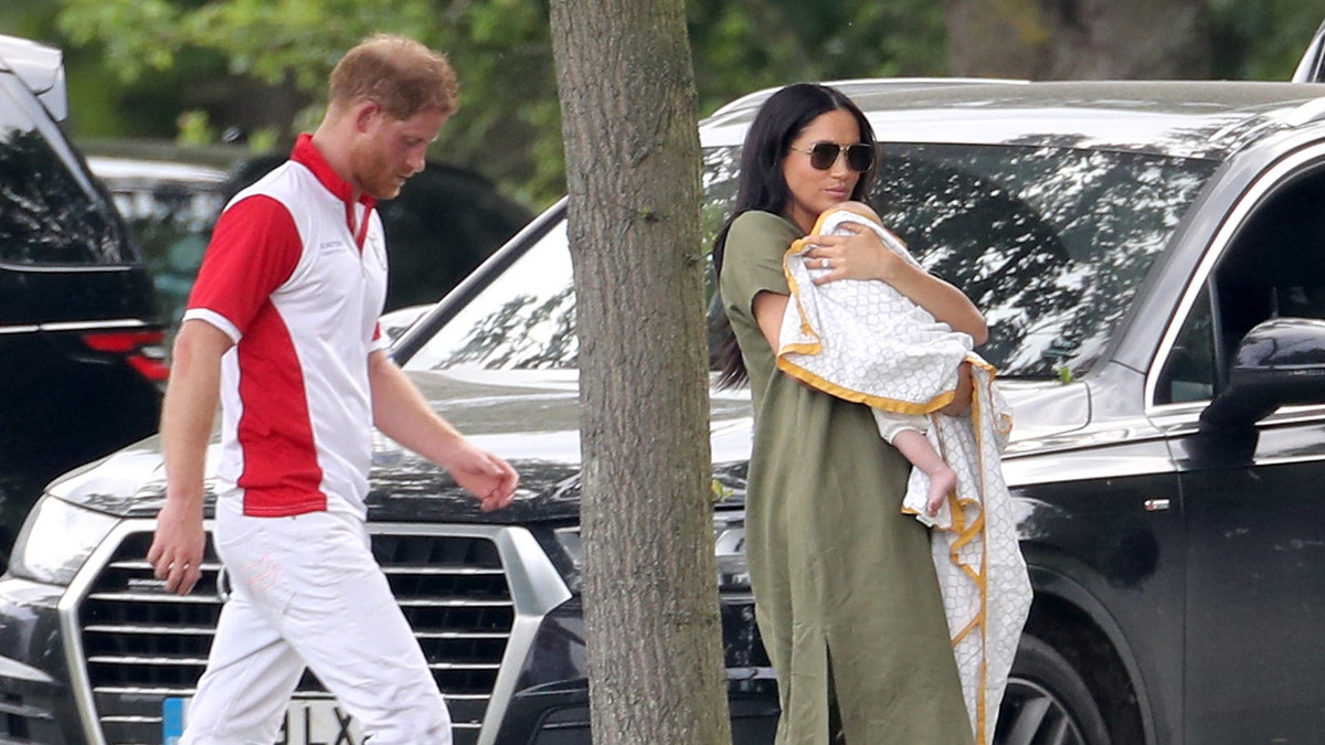 Prince Harry, Duke of Sussex, Meghan, Duchess of Sussex and son Archie Harrison Mountbatten-Windsor attend The King Power Royal Charity Polo Day at Billingbear Polo Club on July 10, 2019 in Wokingham, England. 