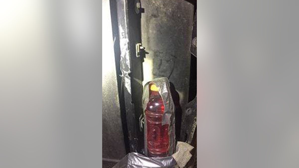 Longmont police pulled over a man in Colorado after they spotted a red sports drink where his tail light should've been .