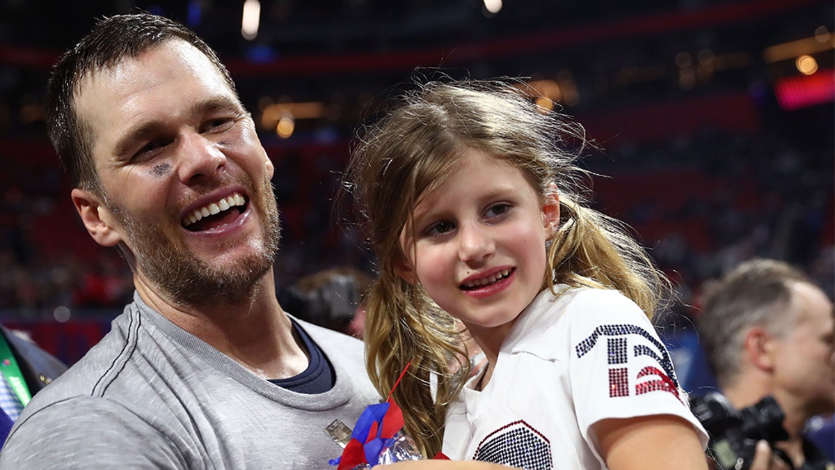 FILE – ATLANTA, GEORGIA - FEBRUARY 03: ?Tom Brady #12 of the New England Patriots celebrates with Vivian Lake Brady after his 13-3 win against Los Angeles Rams during Super Bowl LIII at Mercedes-Benz Stadium on February 03, 2019 in Atlanta, Georgia. (Photo by Maddie Meyer/Getty Images)