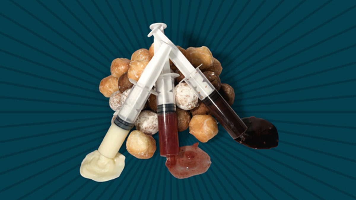The Wingwalker Donut Flight features doughnut holes with syringes. The syringes are for injecting tasty fillings. But the optics raised some strong concerns.