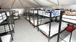 FILE - This undated photo released by U.S. Department of Health and Human Services shows inside of the HHS' facility at Tornillo, Texas. On Friday, June 28, 2019, border officials were expected to unveil the newest outdoor facility meant to detain immigrant children and families who cross the U.S. border near Yuma, Ariz. Over the last two years, that area has seen a tremendous spike in the number of families and children who travel unaccompanied. (U.S. Department of Health and Human Services via AP, File)