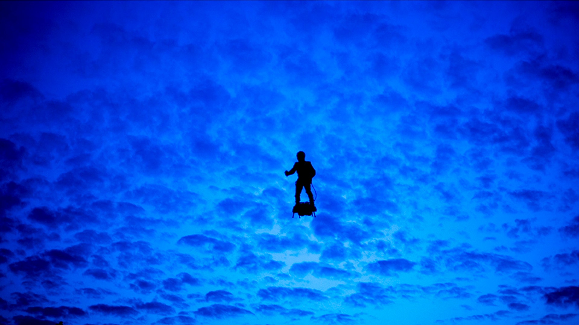 A French soldier on a hoverboard, lands on the Champs Elysees during a rehearsal for the Bastille Day parade, in Paris, July 12, 2019. 