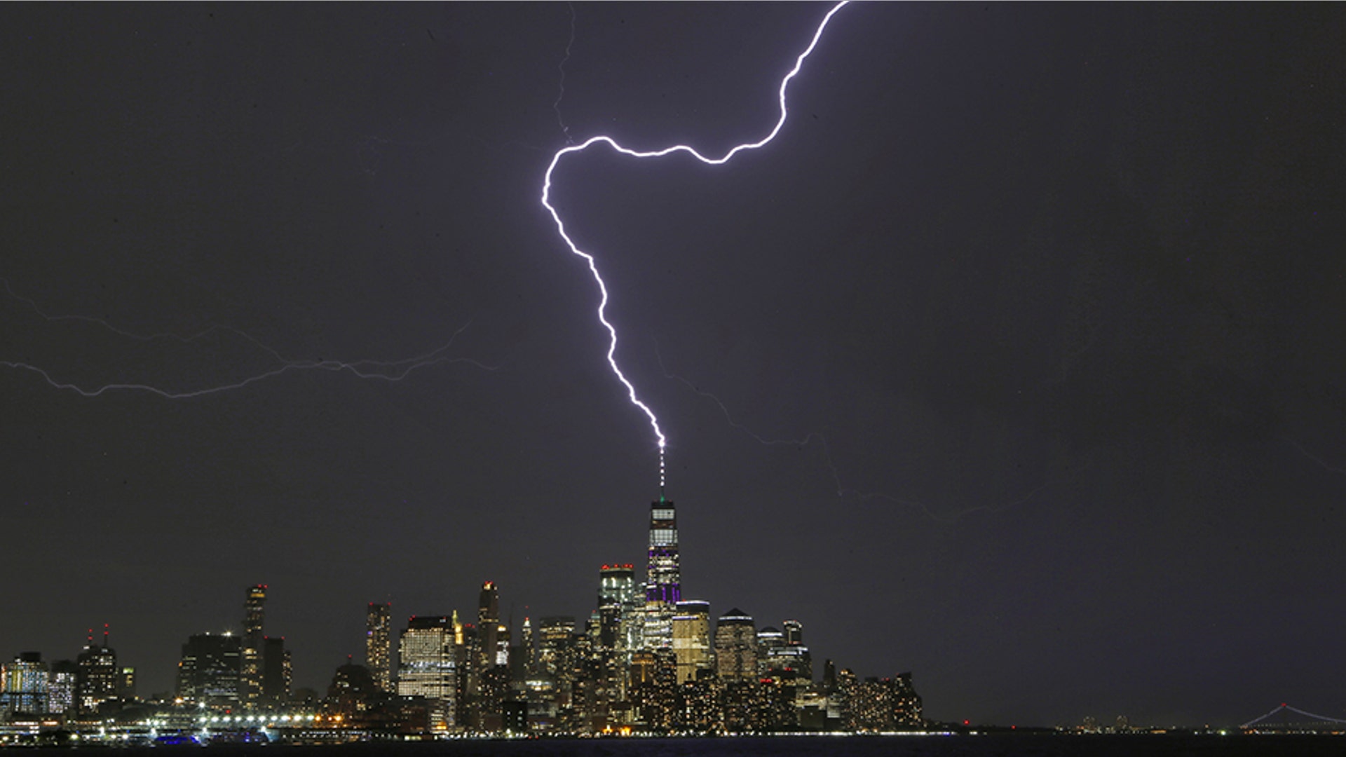 Lightning strikes One World Trade Center during a thunderstorm in New York City, July 17, 2019.