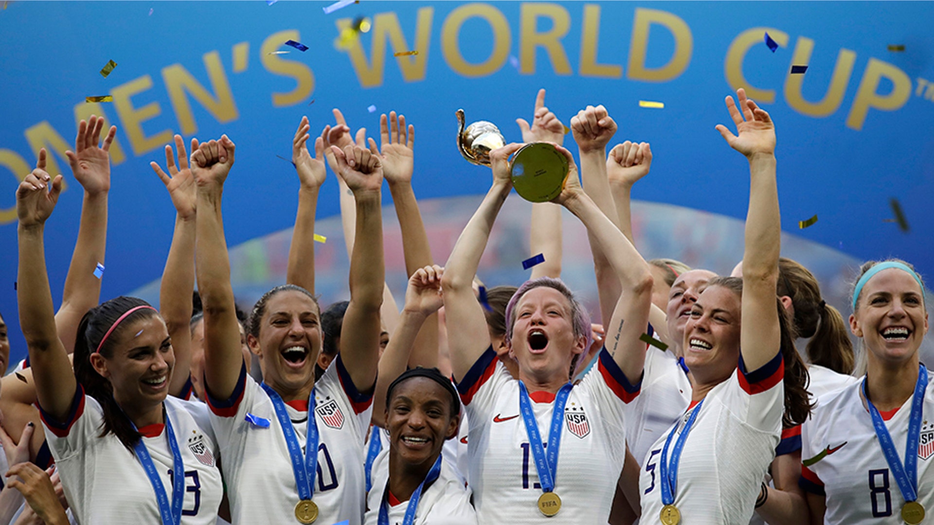 Megan Rapinoe lifts the trophy after the United States won the Women's World Cup soccer final in Lyon, France, July 7, 2019. 