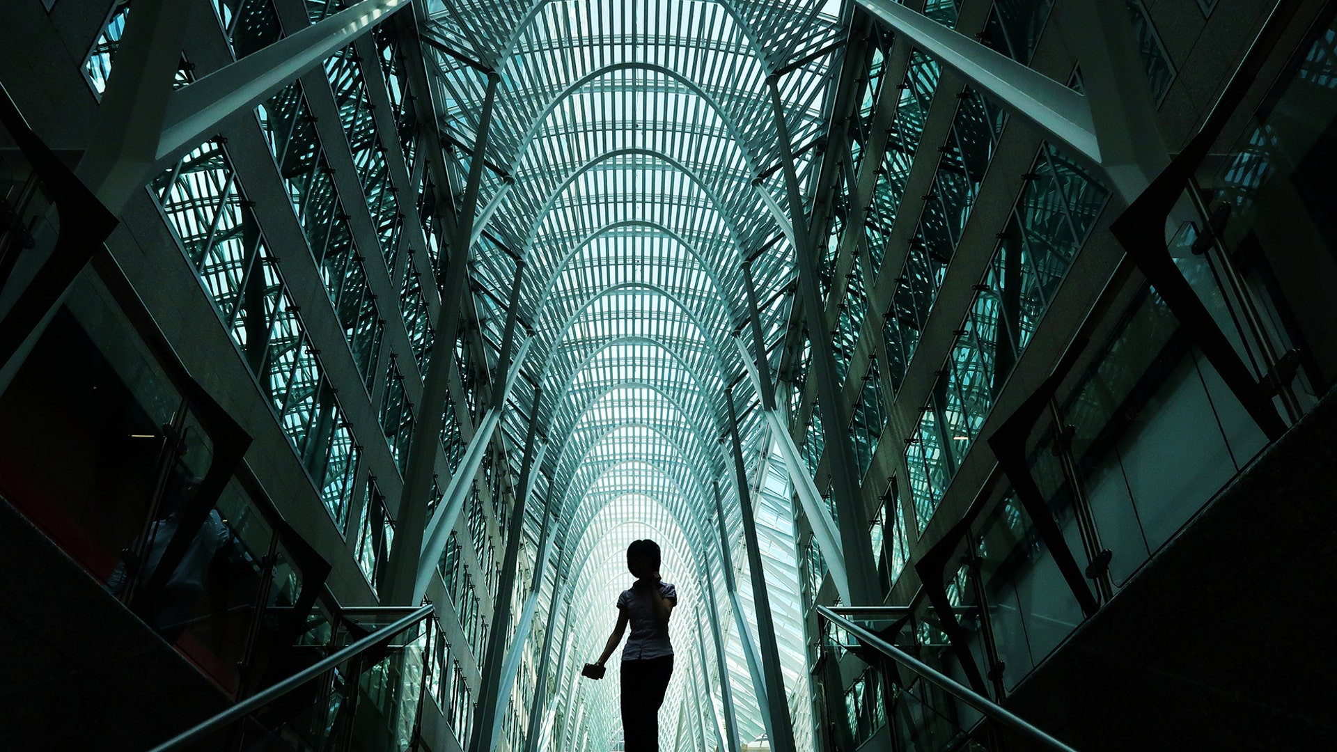 A person walks through the atrium of Brookfield Place in Toronto, Canada, July 23, 2019.