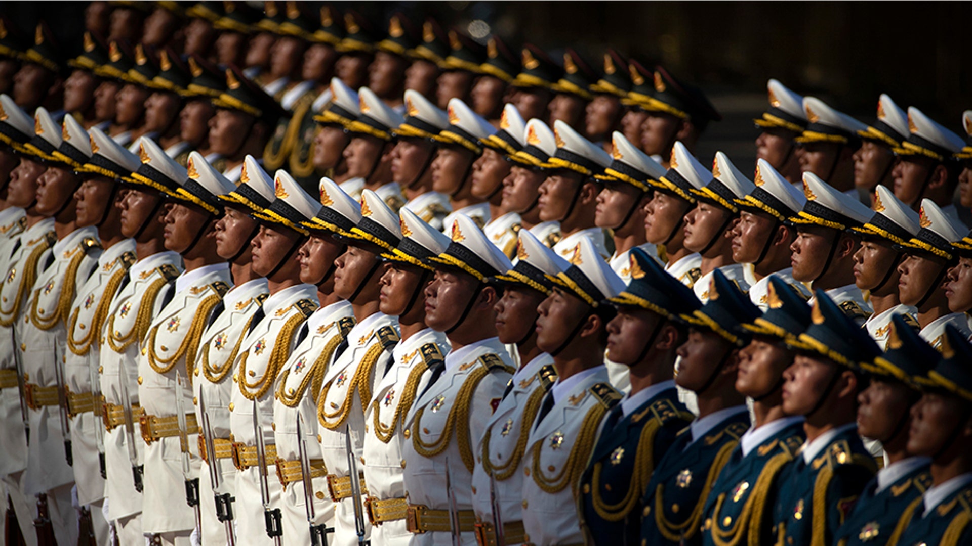 Members of a Chinese honor guard stand at attention during a welcome ceremony for Bulgarian President Rumen Radev at the Great Hall of the People in Beijing, July 3, 2019.