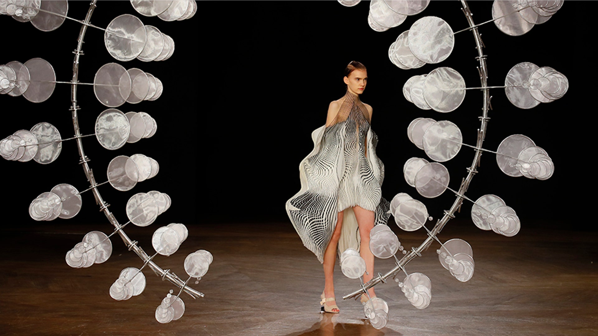 A model wears a creation for Iris van Herpen Haute Couture Fall-Winter 2019-2020 fashion collection presented in Paris, July 1 2019. 