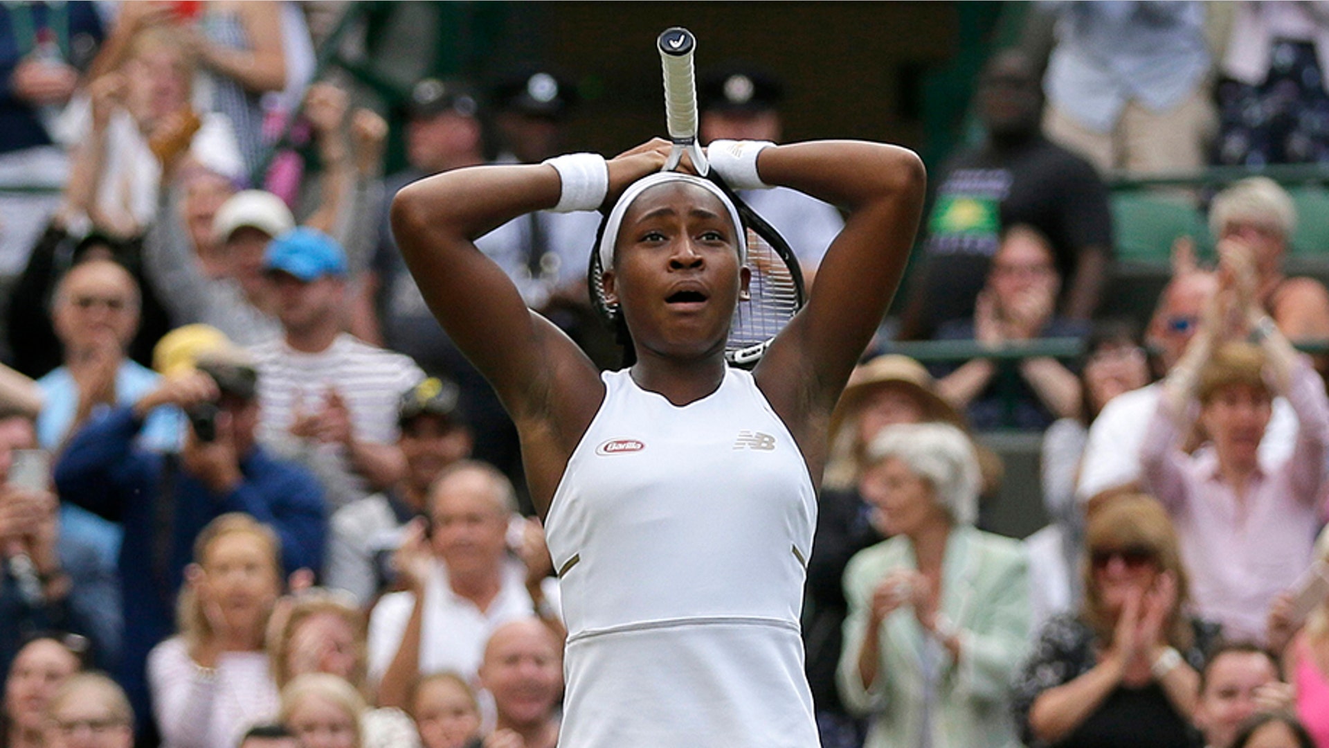 United States' Coco Gauff reacts after beating Venus Williams in a women's singles match during day one of the Wimbledon Tennis Championships in London, July 1, 2019.