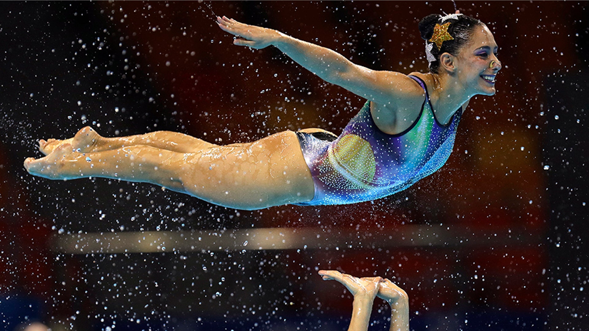 Mexican swimmers performs their routine during the artistic swimming team free final at the World Swimming Championships in Gwangju, South Korea, July 19, 2019. 