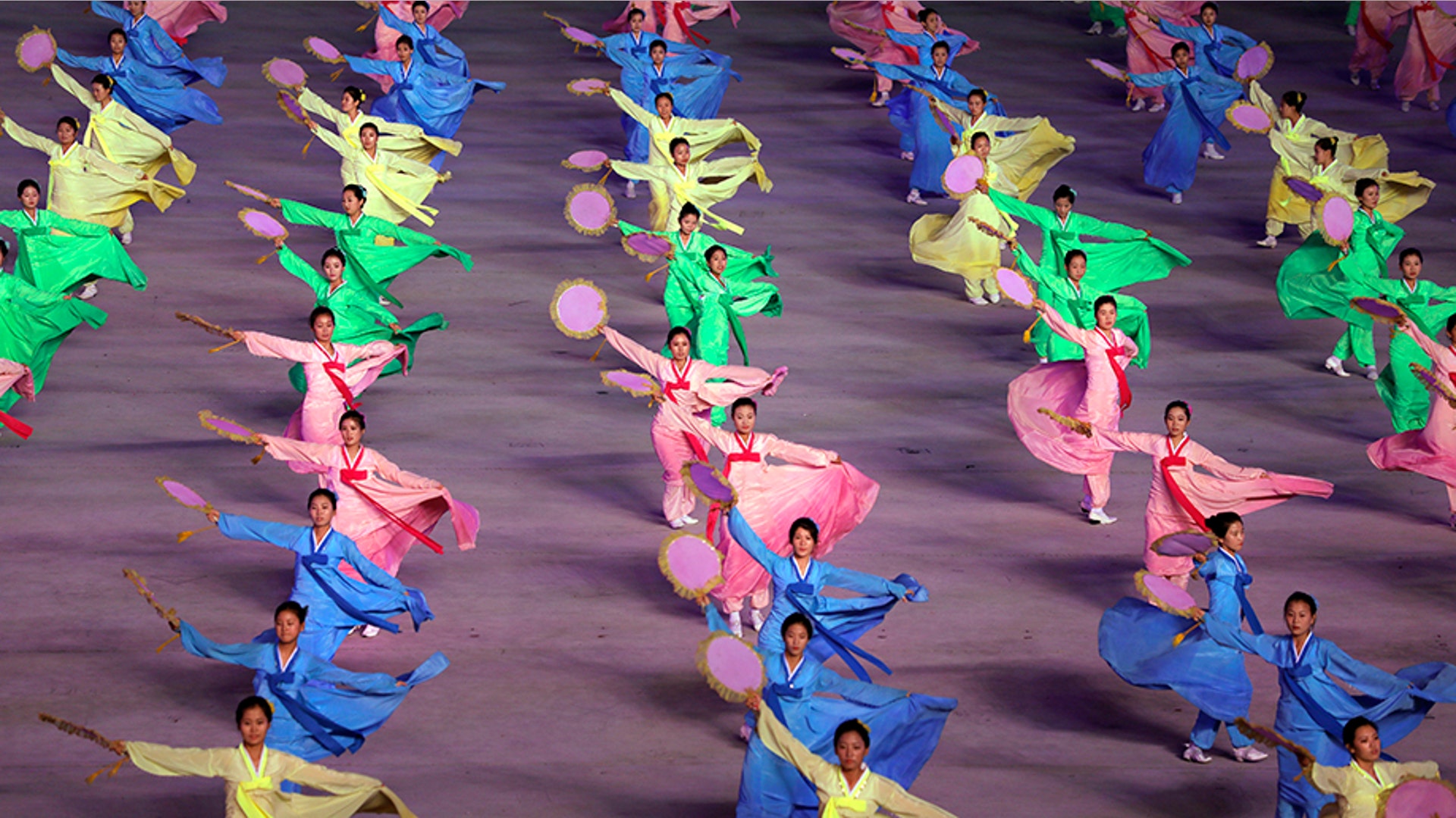 North Koreans perform during a mass game performance of "The Land of the People" at the May Day Stadium in Pyongyang, North Korea, July 16, 2019. 