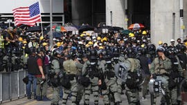 Hong Kong police fire tear gas at protesters