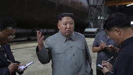 Kim Jong Un inspects new submarine in a bid to mount pressure on US to revive talks, report says