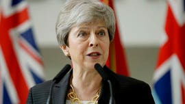 British ambassador who called Trump 'inept' has Theresa May's 'full support'