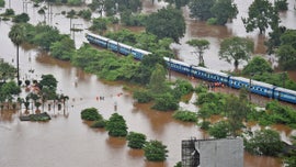 700 people rescued from trapped train in India floods
