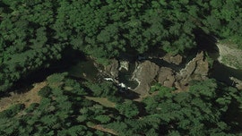 Father, son injured after plummeting down 15-foot Washington waterfall