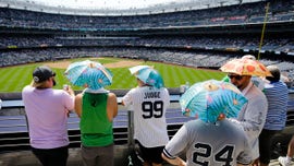 Big league ballparks broil as heat wave grips much of majors