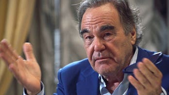 Oliver Stone asks Putin to be his daughter's godfather in bizarre interview