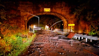 Pregnant Pennsylvania woman and son, 9, killed after car swept away by floodwaters