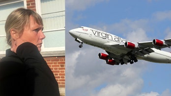 Virgin Atlantic passenger restrained on flight after attacking boy, 8