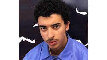 Brother of Manchester suicide bomber appears in court, faces 22 murder charges