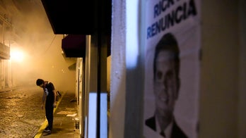 Lawmakers call for Puerto Rico's governor to step down amid widespread protests on island