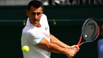 Bernard Tomic fined more than $56,000 for lack of effort during Wimbledon match