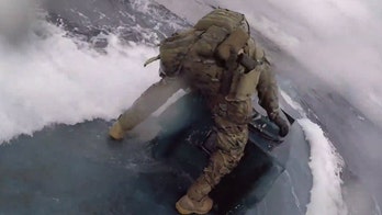 Video shows dramatic jump by Coast Guardsmen onto vessel laden with cocaine: officials