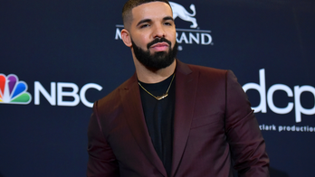 Drake shares first public images of son Adonis: 'I love and miss my beautiful family'