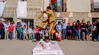 Story behind Spain's bizarre 'baby jumping' festival