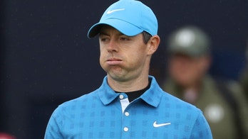 Rory McIlroy breaks woman's phone with errant tee shot on first hole of British Open