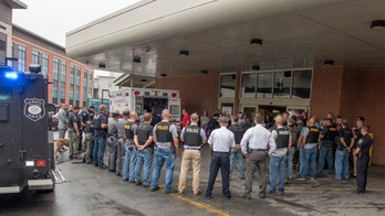 Officers line up in tribute to boy entering hospice with cancer