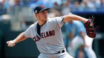 Cleveland Indians' Trevor Bauer launches ball over center field wall in frustration