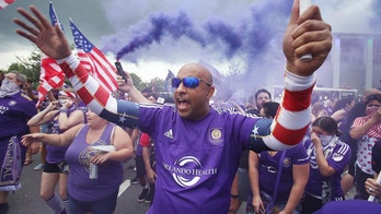 Orlando City SC fans storm empty seats to distract NYCFC during penalty kicks