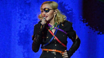Madonna closes World Pride performance with message about gun control using police imagery